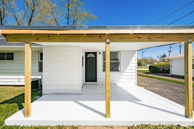view of front of property featuring central AC unit