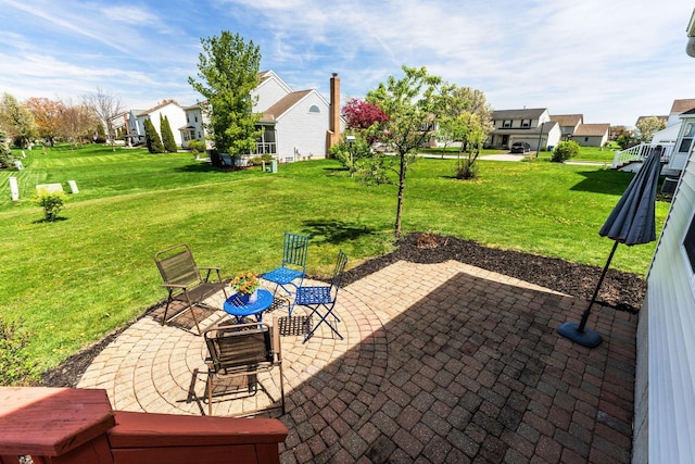 view of patio with a residential view