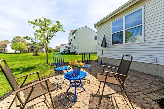 view of patio / terrace with a residential view