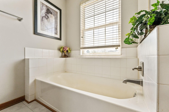 full bathroom with a garden tub and tile patterned floors