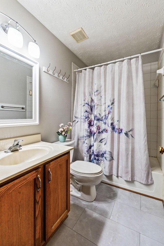 full bathroom featuring a textured ceiling, vanity, shower / tub combo with curtain, toilet, and visible vents