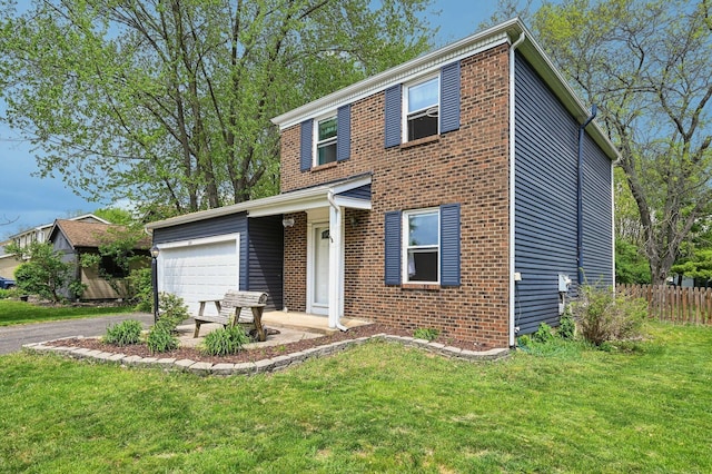 traditional home featuring an attached garage, fence, a front lawn, and aphalt driveway