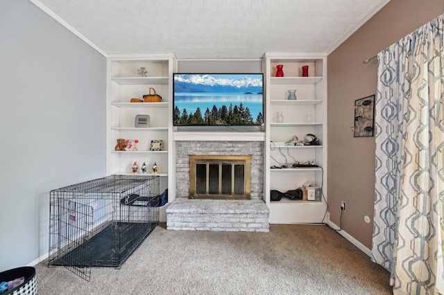 living area featuring a fireplace, a textured ceiling, built in shelves, carpet, and ornamental molding