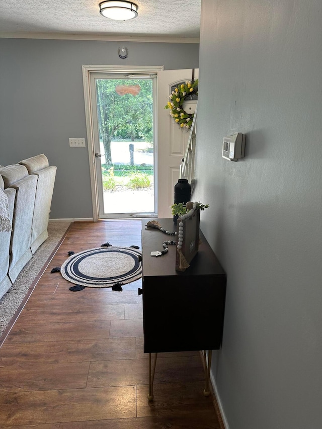 604 Forestwood Dr, Gahanna, OH 43230 - doorway featuring hardwood / wood-style flooring and a textured ceiling