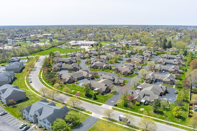 birds eye view of property with a residential view