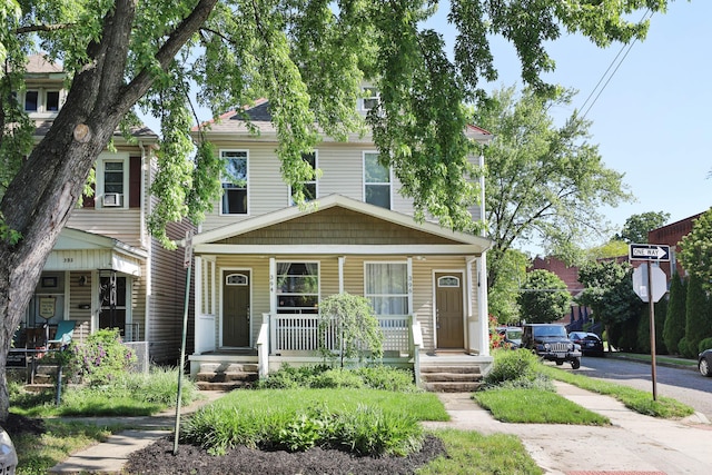 traditional style home with covered porch
