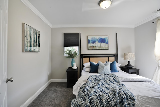carpeted bedroom featuring visible vents, baseboards, and ornamental molding