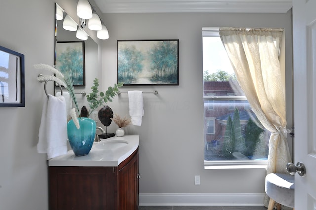bathroom with baseboards and vanity