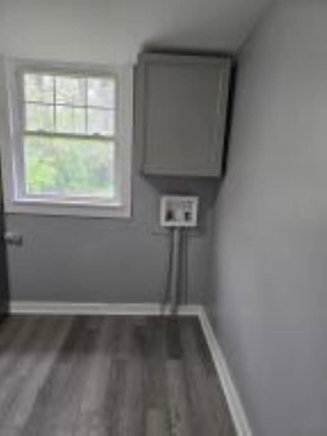 404 Sherman Ave, Springfield, OH 45503 - laundry room with hookup for a washing machine, baseboards, cabinet space, and dark wood finished floors