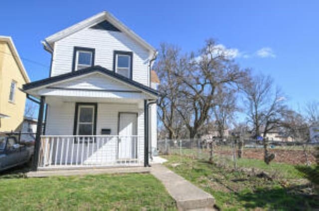 404 Sherman Ave, Springfield, OH 45503 - view of front of property with a porch and fence