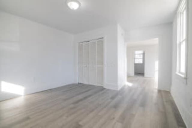 404 Sherman Ave, Springfield, OH 45503 - spare room featuring wood finished floors