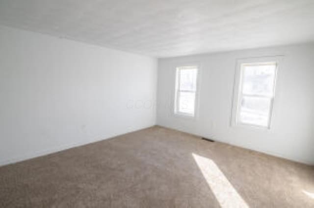 404 Sherman Ave, Springfield, OH 45503 - empty room with carpet floors