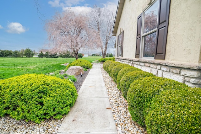 surrounding community with a lawn