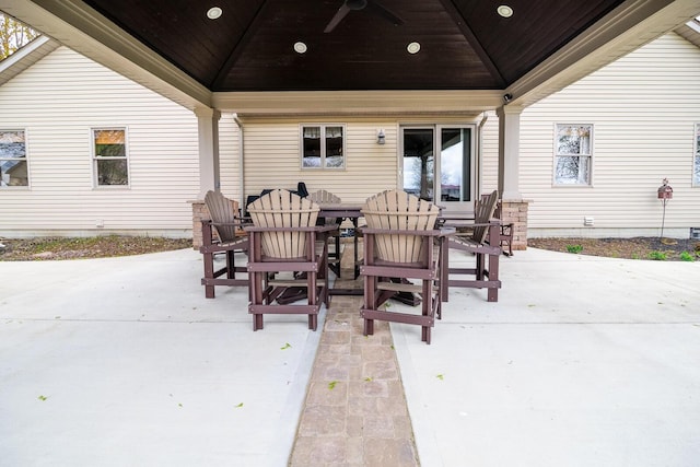 view of patio with ceiling fan, outdoor dining area, and a gazebo