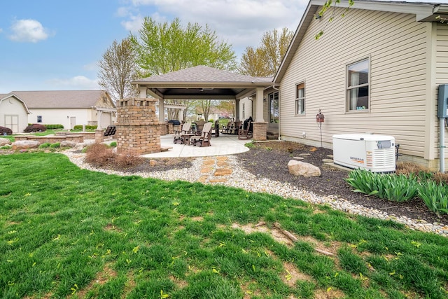 view of yard with a gazebo and a patio