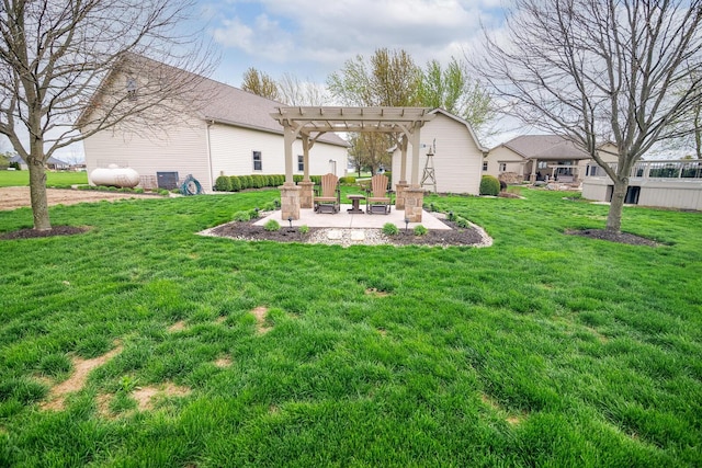 view of yard with a pergola, a patio, and an outdoor fire pit