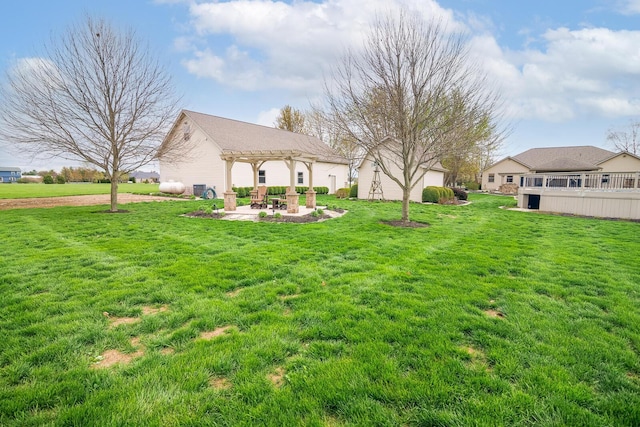 view of yard with a pergola and a patio area