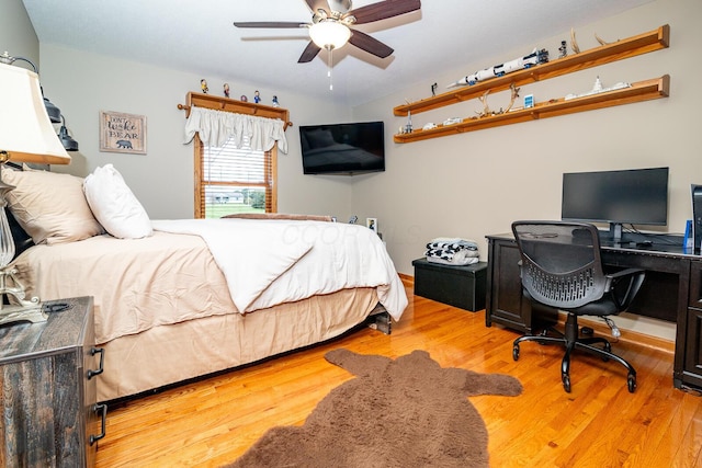bedroom featuring wood finished floors and ceiling fan