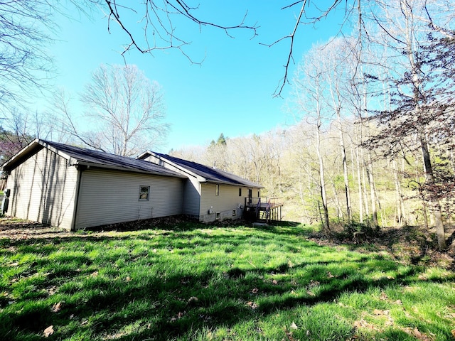 view of home's exterior featuring a yard