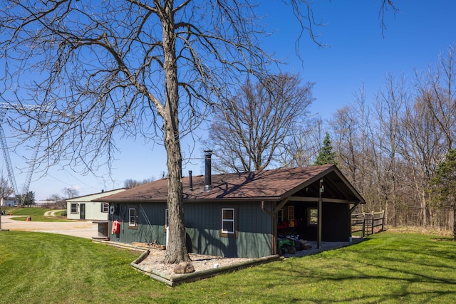 9704 Loudon St, Johnstown, OH 43031 - rear view of house with a lawn