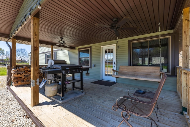 9704 Loudon St, Johnstown, OH 43031 - wooden terrace with ceiling fan and a grill