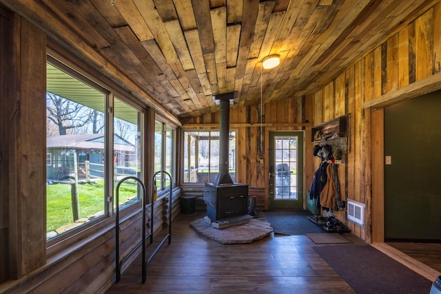 9704 Loudon St, Johnstown, OH 43031 - interior space featuring a wood stove and visible vents
