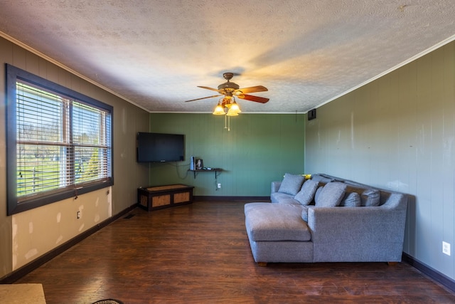 9704 Loudon St, Johnstown, OH 43031 - living room featuring wood finished floors, a textured ceiling, and crown molding