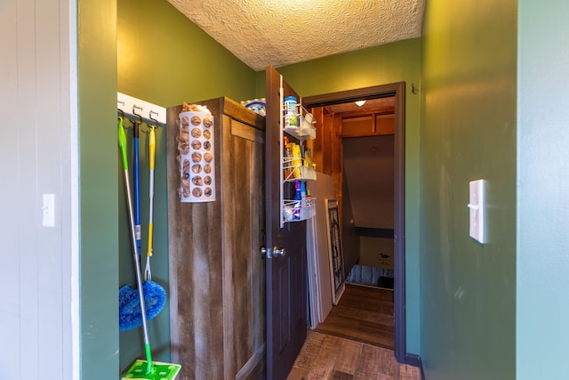 9704 Loudon St, Johnstown, OH 43031 - corridor with dark wood-style flooring and a textured ceiling
