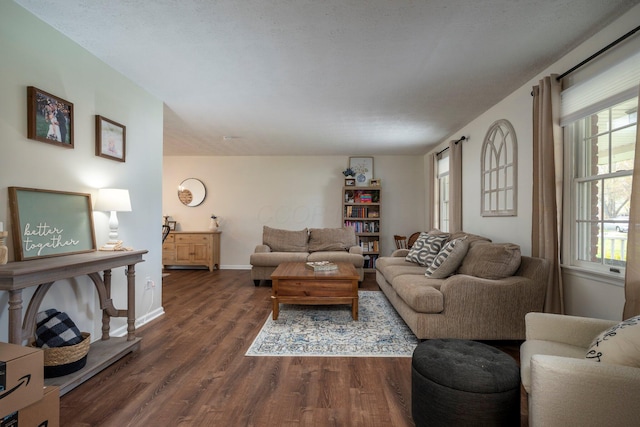 1005 Glenn Ave, Washington Court House, OH 43160 - living area with dark wood-style flooring, plenty of natural light, and baseboards