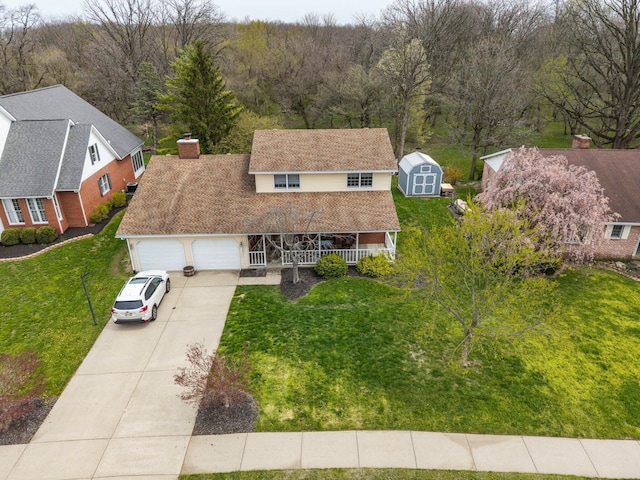 1005 Glenn Ave, Washington Court House, OH 43160 - view from above of property featuring a heavily wooded area