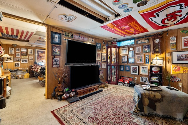1479 Devonhurst Dr, Columbus, OH 43232 - living area featuring wood walls, carpet flooring, and a paneled ceiling