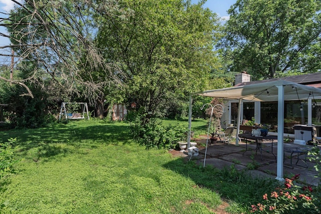 1479 Devonhurst Dr, Columbus, OH 43232 - view of grassy yard featuring a gazebo and a patio