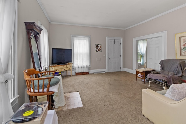 carpeted living area featuring baseboards and ornamental molding
