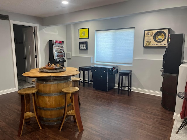 bar with recessed lighting, baseboards, and dark wood-style floors