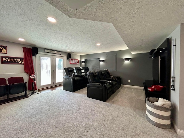 cinema room featuring carpet flooring, a textured ceiling, and recessed lighting