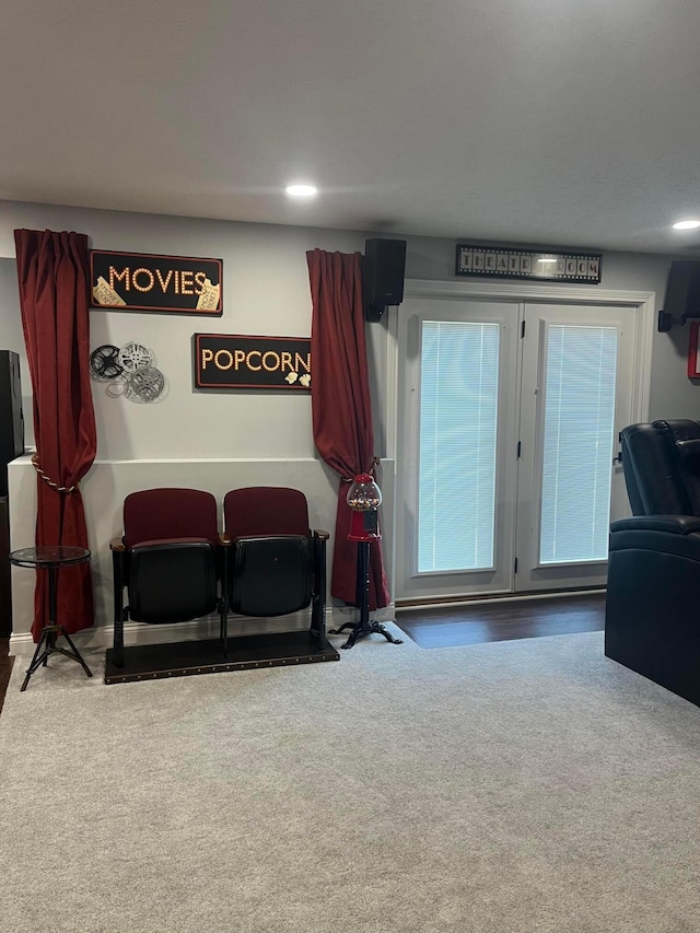 living area featuring recessed lighting and carpet flooring