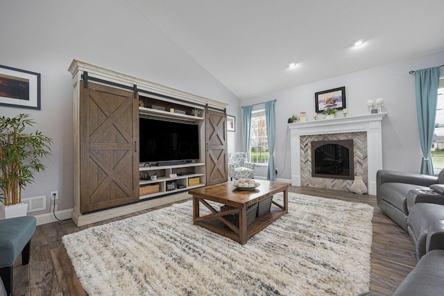 living area with vaulted ceiling, a fireplace, baseboards, dark wood-style floors, and recessed lighting
