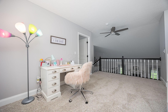 office area featuring a ceiling fan, baseboards, and carpet