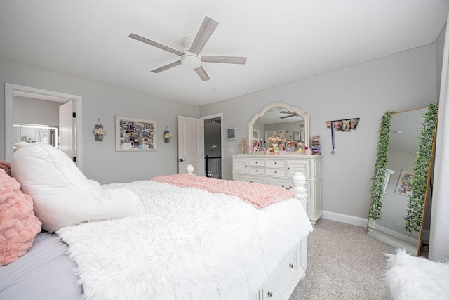 bedroom with baseboards, a ceiling fan, and light colored carpet