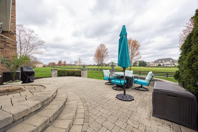 view of patio / terrace featuring grilling area and outdoor dining area