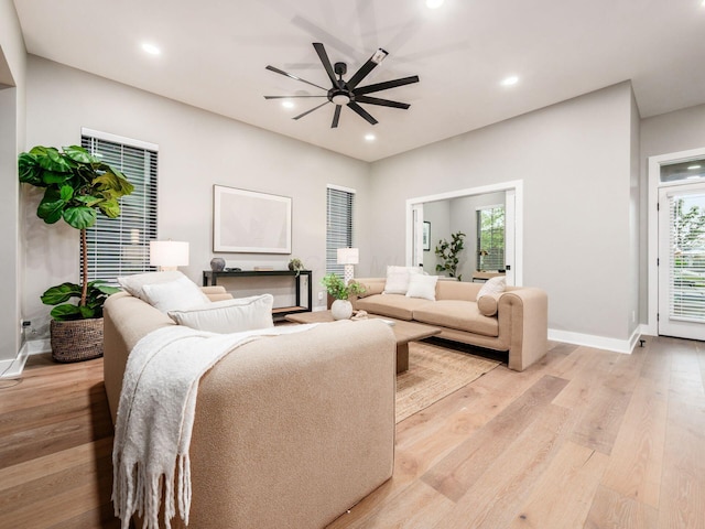 496 W 1st Ave, Columbus, OH 43201 - living room featuring light wood finished floors, a ceiling fan, baseboards, and recessed lighting
