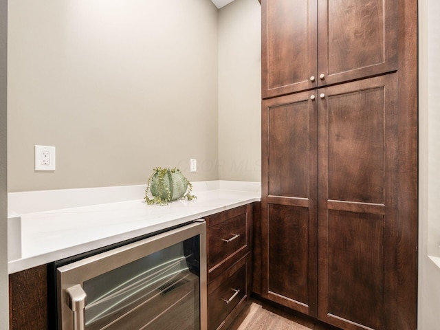 496 W 1st Ave, Columbus, OH 43201 - bar with beverage cooler and light wood finished floors