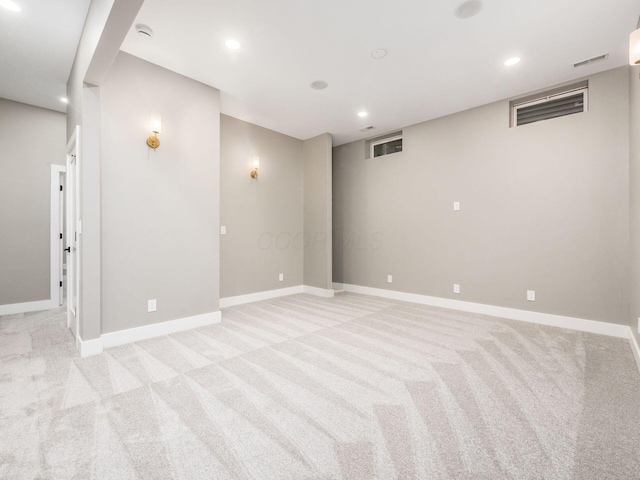 496 W 1st Ave, Columbus, OH 43201 - spare room with light carpet, baseboards, recessed lighting, and a smoke detector