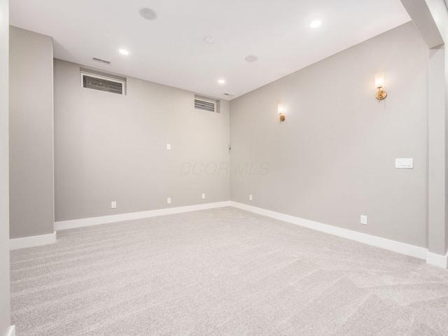 496 W 1st Ave, Columbus, OH 43201 - finished below grade area featuring light colored carpet, baseboards, and recessed lighting