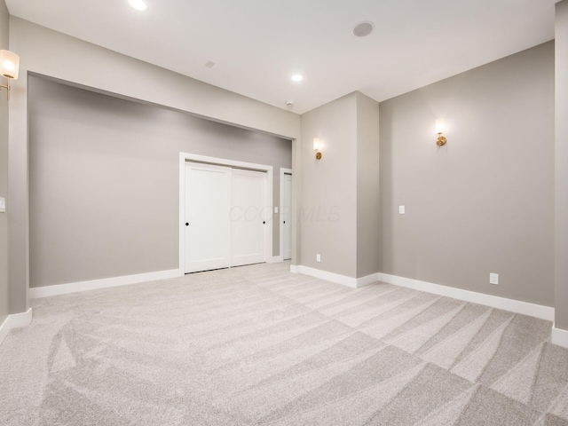 496 W 1st Ave, Columbus, OH 43201 - unfurnished room featuring light carpet, baseboards, and recessed lighting