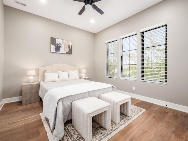 496 W 1st Ave, Columbus, OH 43201 - bedroom featuring baseboards, light wood finished floors, recessed lighting, and ceiling fan