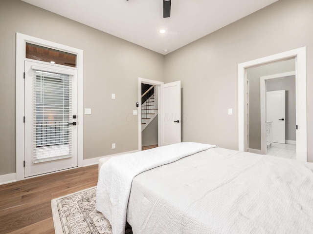 496 W 1st Ave, Columbus, OH 43201 - bedroom featuring light wood finished floors, ceiling fan, and baseboards