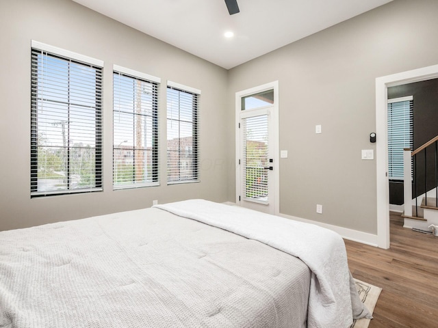 496 W 1st Ave, Columbus, OH 43201 - bedroom featuring wood finished floors, a ceiling fan, recessed lighting, and baseboards