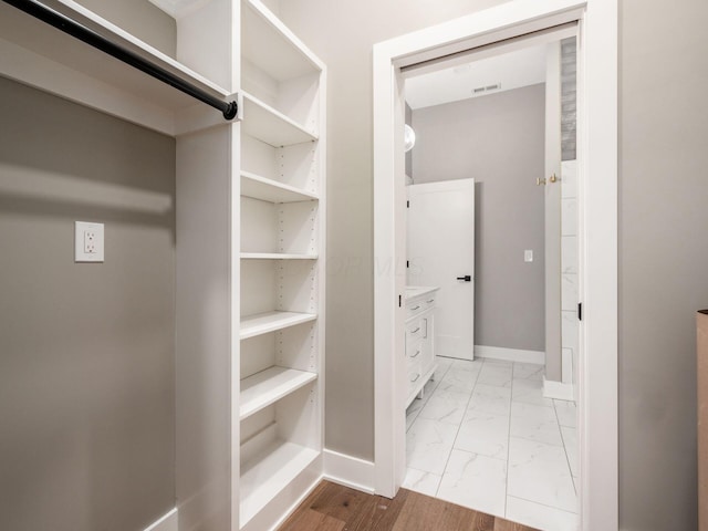 496 W 1st Ave, Columbus, OH 43201 - walk in closet with light marble finish flooring
