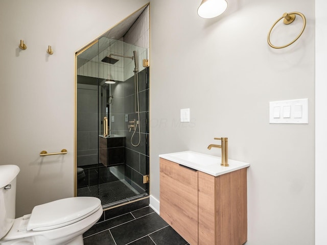 496 W 1st Ave, Columbus, OH 43201 - bathroom featuring toilet, a stall shower, tile patterned flooring, and baseboards
